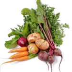 Arrangement of Raw Organic Farmer's Potato, Carrot, Red Onion and Beet isolated on white background